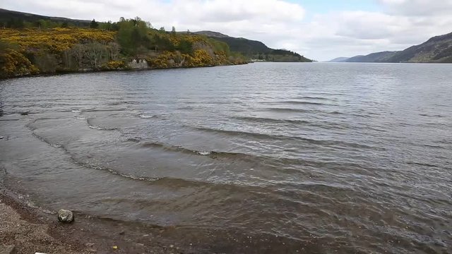 Loch ness Scotland uk popular tourist attraction viewed from Fort Augustus south west end of the lake in the Scottish Highlands pan