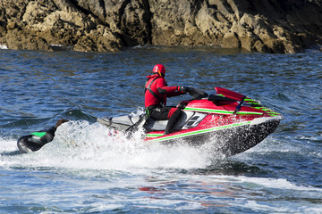Fototapeta premium lifeguards in jet ski in rescue training
