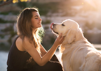 girl loving her dog