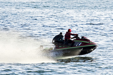 Fototapeta premium lifeguards in jet ski in rescue training