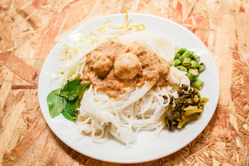 Rice noodles in fish curry sauce (Kanom Jeen Nam Ya).