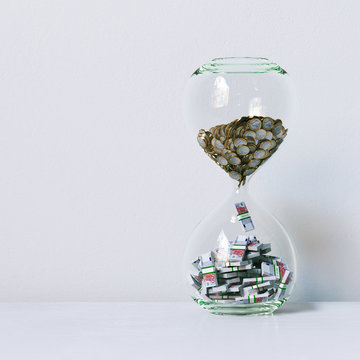 Time is money. Conceptual picture in white interior 