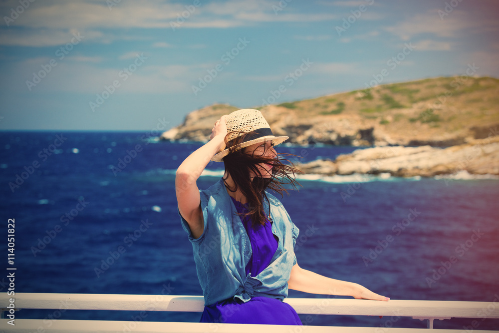 Wall mural young woman in Greece