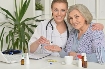 young doctor and her senior senior patient 