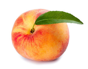 Fototapeta na wymiar one whole peach with leaf isolated on white