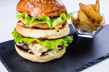 Tasty grilled  burger. Restaurant food concept.
