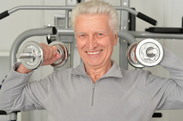 Fototapeta na wymiar Elderly man in gym