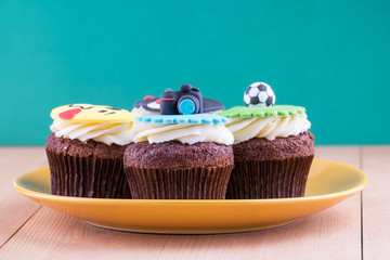 Delicious cupcakes on table
