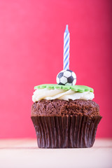 Delicious cupcake on table