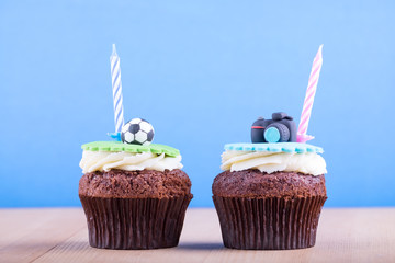 Delicious cupcakes on table