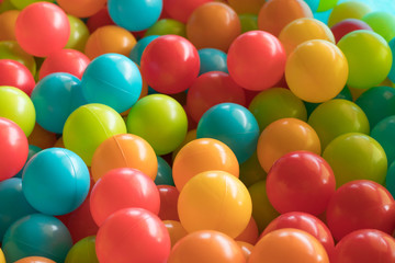Bright and Colorful toy balls, kids ball pit background, softpla