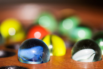 Close up of marbles in a solitare game