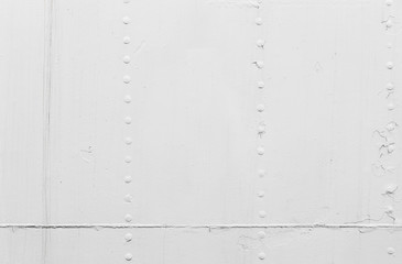 White ship hull, metal sheets with rivets