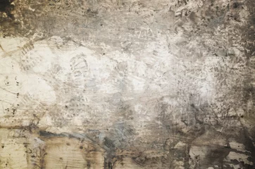 Fotobehang Verweerde muur Vuile houten vloer met voetafdrukken