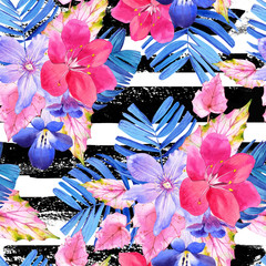 Seamless pattern with pink and blue realistic watercolor flowers.