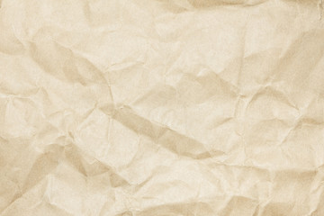 Brown paper sheet. Closeup recycled crumpled brown paper texture. Recycled crumpled brown paper background with copy space for text or image.