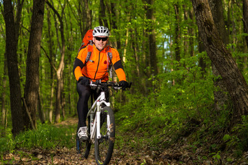 Naklejka premium healthy lifestyle and fitness concept with mount bike man outdoor
