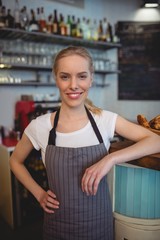 Portrait of confident female worker at coffee house