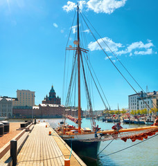 Jetty with sailing ship in old town. Helsinki, Finland