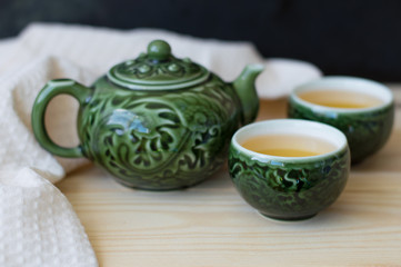 Two small tea bowls and teapot, chinese tea ceremony concept