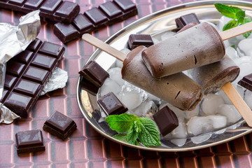 Chocolate ice cream popsicles.