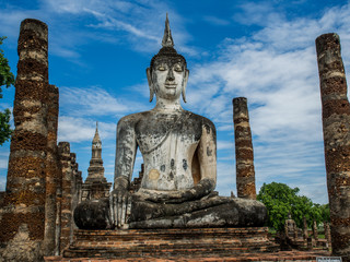 An ancient buddha statue at Mahathat Temple, an ancient temple in Sukhothai Historical Park, Sukhothai, Thailand. 