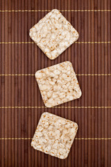 Obraz na płótnie Canvas Composition of square three crunchy rye crispbreads