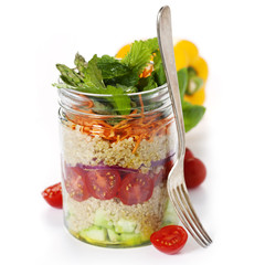 Cucumber, quinoa, tomato, onion, carrot and mint salad in a jar