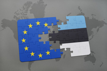 puzzle with the national flag of estonia and european union on a world map background.