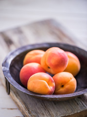 rustic bowl with fresh ripe nectarines