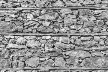 Stylish stone wall background in black and white