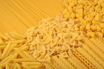 Assortment of uncooked Italian pasta close up