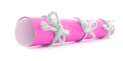 Pink paper scroll tied with string, three natural bows isolated