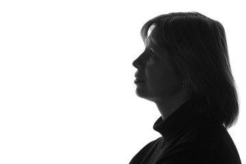 silhouette of a sad pensive woman