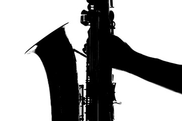 man holding a saxophone