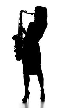 young woman playing the saxophone