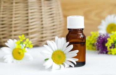 Small bottle of essential chamomile oil
