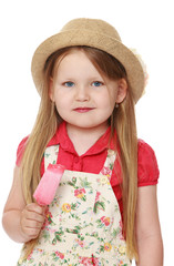 Adorable little girl in hat and pants, holds up the ice cream. Close-up-Isolated on white background
