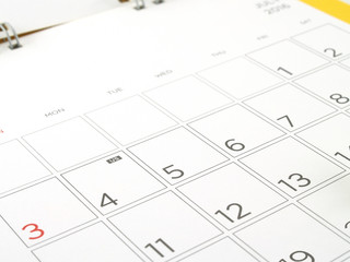 close-up acronym letters US sign in fourth of july, date numbers in grid of desk calendar page, independence day or american national day concept