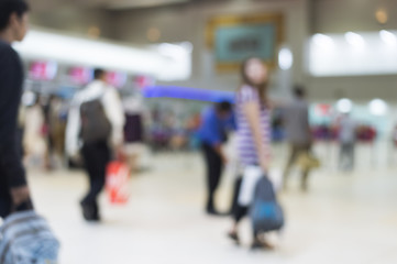 Abstract blur of people in airport terminal