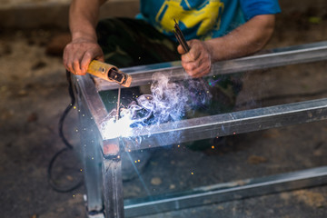 Arc welding of a steel at work site