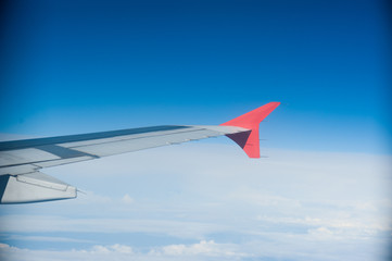 Fototapeta premium Wing aircraft in the sky during the flight