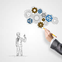 Businesswoman making sketches 