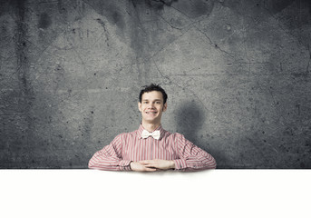 Cheerful man with banner