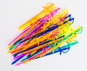 Colorful plastic sticks for sandwiches
