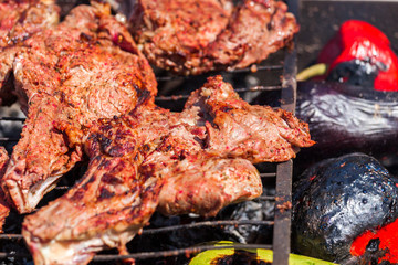 Roasted meat on the grill.