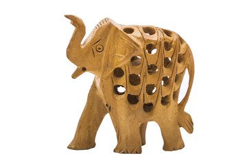 Handmade wooden yellow elephant with holes on isolated background