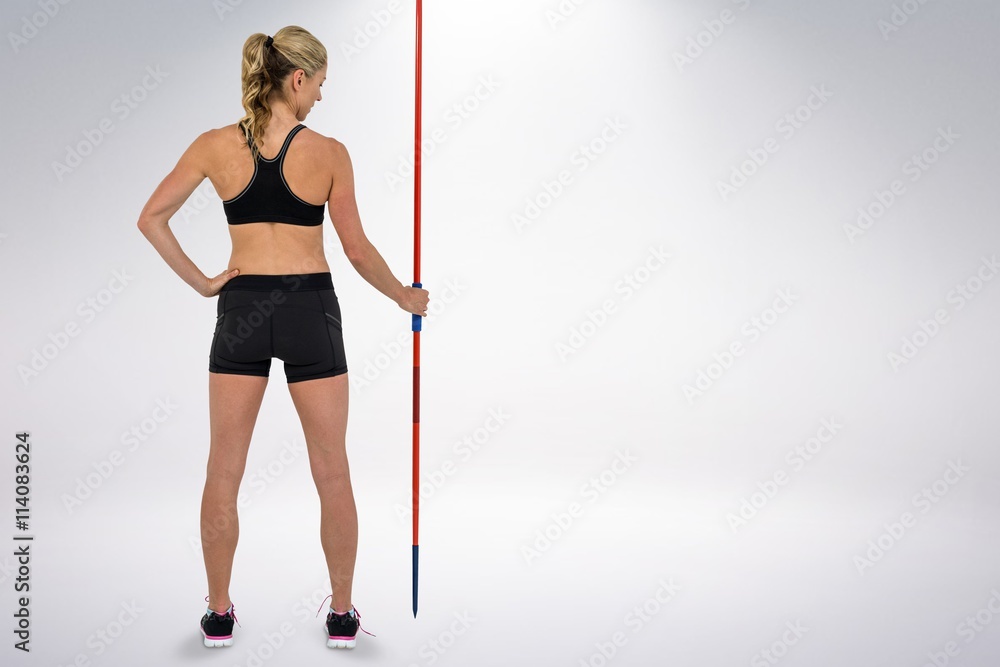 Poster composite image of athlete standing with javelin