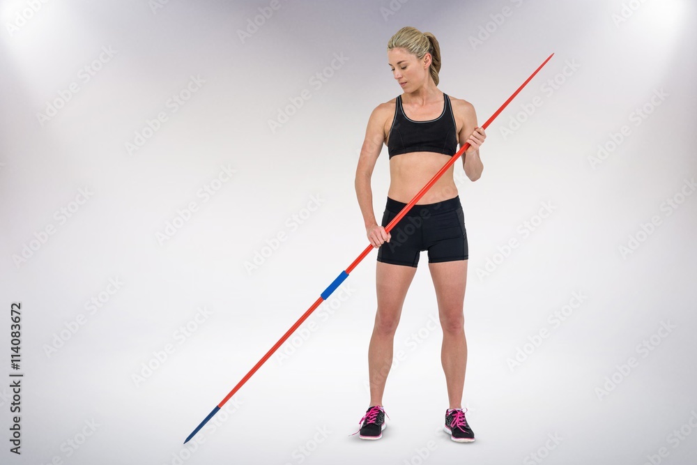 Poster composite image of athlete standing with javelin