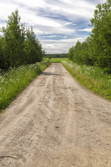 Fototapeta premium Gravel Road in Farm Land